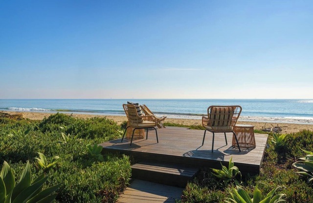 Step out to Padaro Beach from this luxurious 5-bedroom 5 bath compound