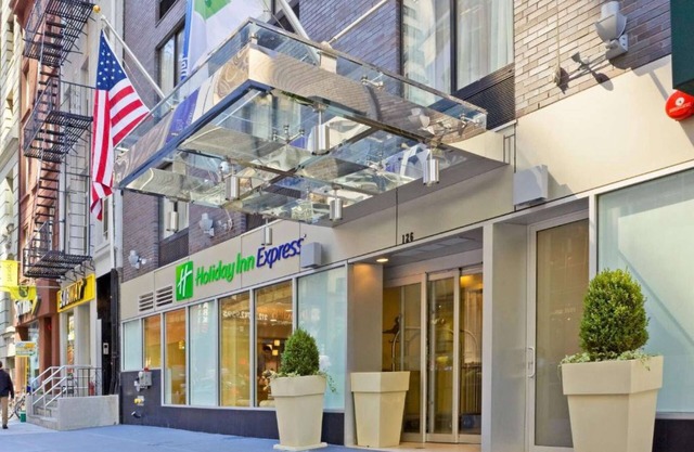 Steps from Wall Street | Free Breakfast. Gym