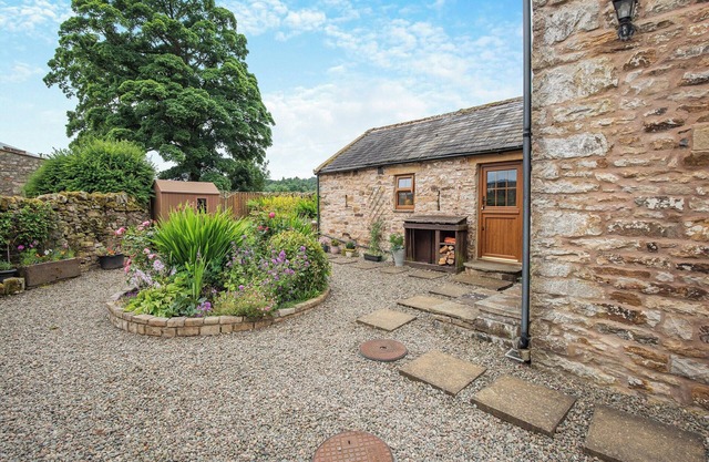 Stone built barn conversion with cosy living spaces and stunning fell views.