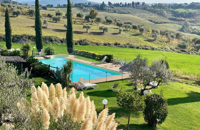 Stone house with private fenced garden area.