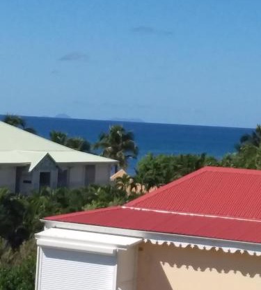 Studio Vue mer Haut de villa anse des rochers