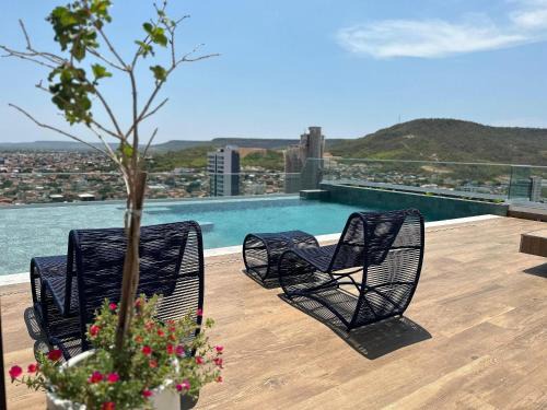 Studios com piscina na cobertura - City House