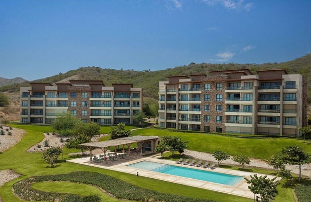 Stunning Apt. with Ocoa's Bay View, 2 bedrooms, Beach Club.