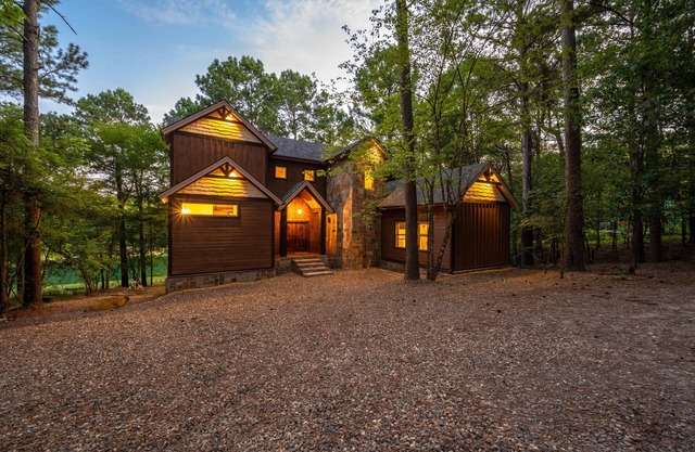 Stunning oversized porch overlooking Pine Lake. Jacuzzi hot tub, outdoor see through fireplace!