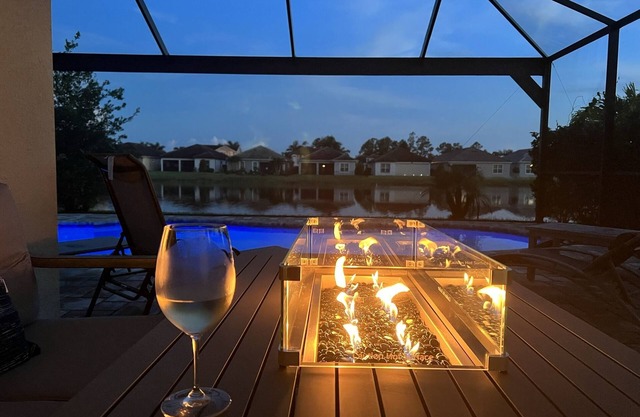 STUNNING POOL HOME WITH LAKE VIEWS