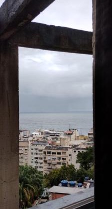 Suíte charmosa com vista pro mar