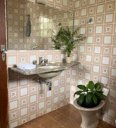 Suíte em casa ampla e confortável