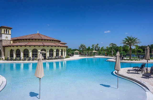 Sunset Lake View Villa with Resort Amenities Near Golf, Beach & Restaurants!