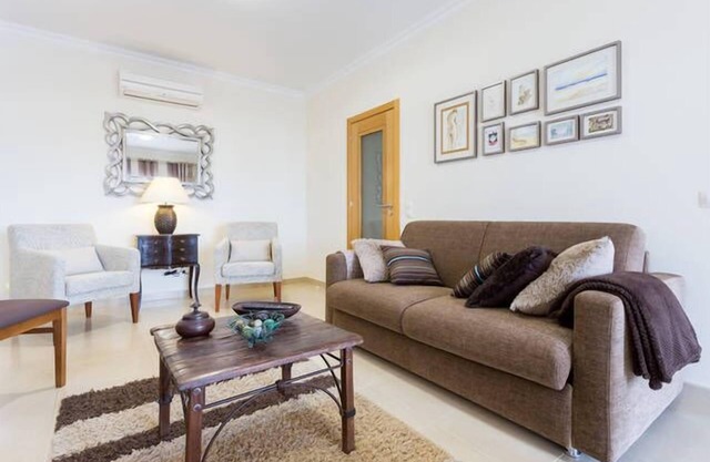 Superb Location! next to marina, beach & town with fantastic pool & balcony