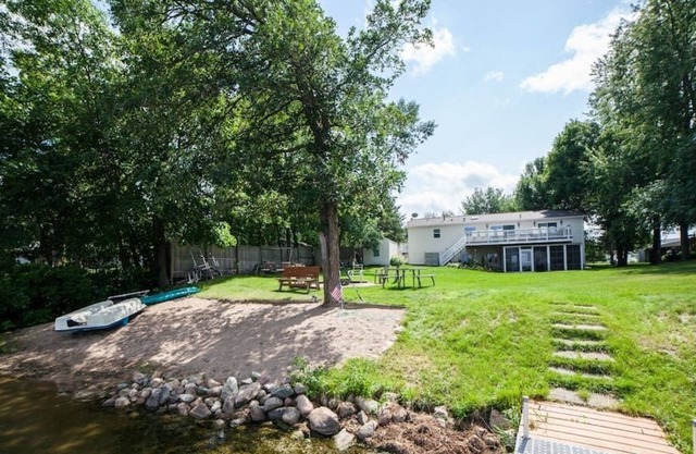 Tamarac Lake Home with Seven Bedrooms and Sand Beach