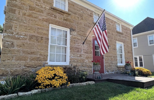 The Iowa Stone House. Enjoy Historic Charm and Spacious Modern Comfort.