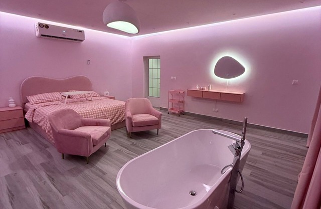 The pink private swimming pool chalet & villa
