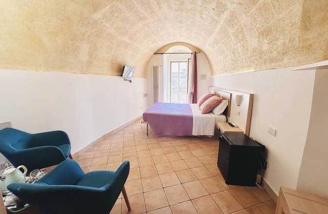 The Smile of the Sassi Rooms. Idris Superior Deluxe on Sassi view.