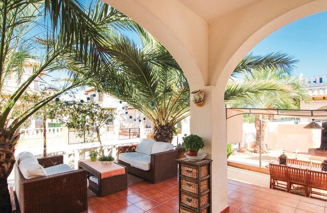 This beautiful vacation townhouse in La Marina, on the Costa Blanca, offers access to a communal poo