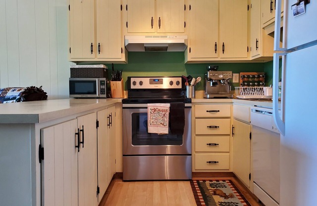 This cheery condo awaits your stay.