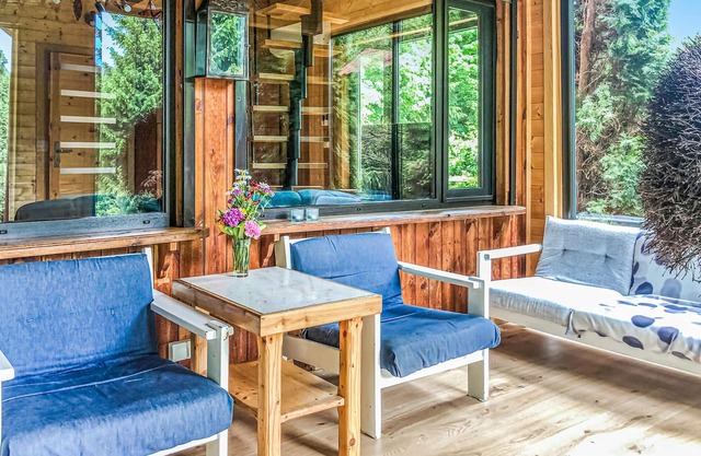 This holiday home is located on the edge of a village, on a large, fenced plot.