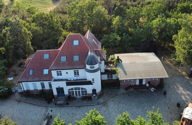 Time out in a beautiful old train station on the edge of the forest in a large loft