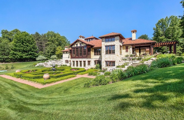 Timeless Euro Tuscan gated estate on 14.5 acres with vineyard, pond and gardens.
