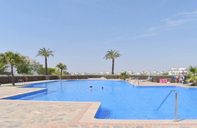 Tranquility: 2-br Retreat at Hacienda Riquelme Golf Resort