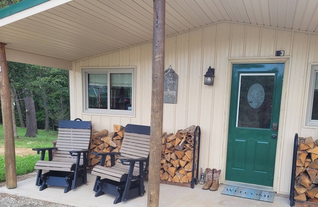 Twin Oaks is a rustic and pet friendly cabin located on 50 mostly wooded acres