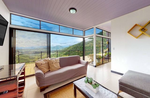 Two-story retreat with incredible views, full kitchen, & fireplace