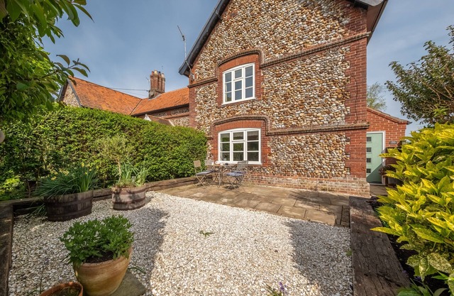 Typical Norfolk brick and flint character cottage which is cosy and comfortable