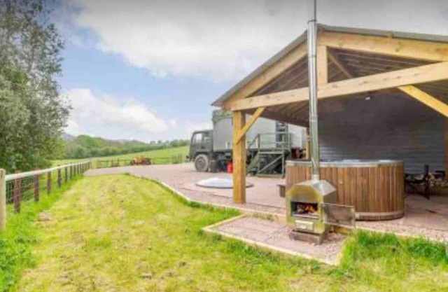 Unique stay in your very own army truck. Sleeps 4. Hot tub. Tranquil setting.