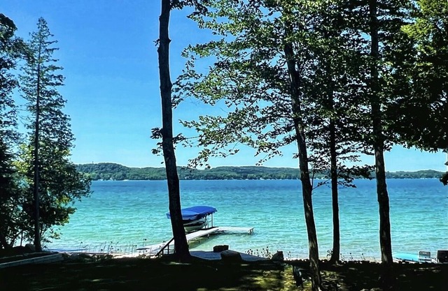 UPDATED TORCH LAKE HOME 5BD/3BA w/PRIV BEACH