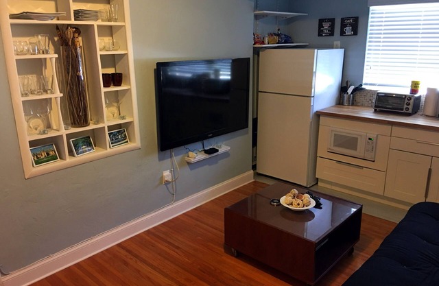 Upscale unit with free parking centrally located