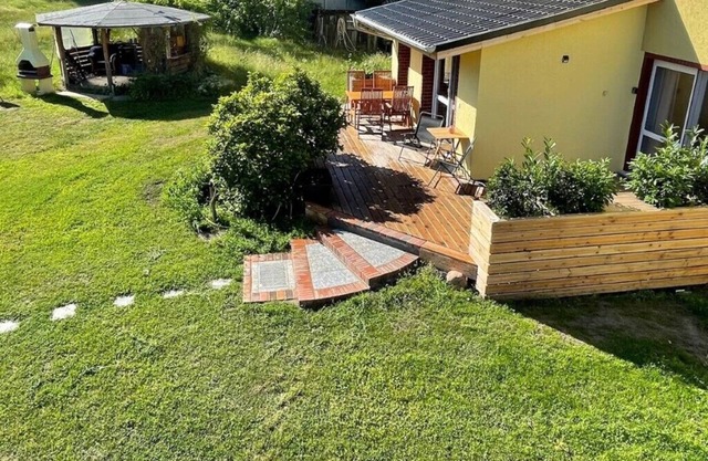 Vacation apartment at Düstersee with terrace and sauna in your own garden