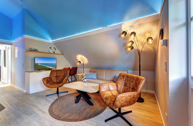 Vacation apartment with private sauna and fireplace, right on the beach.