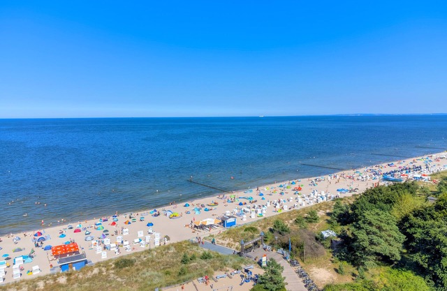 Vacation apartment with private sauna and fireplace, right on the beach.