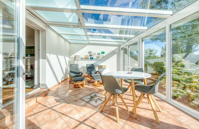 Vacation by the lake with conservatory and garden