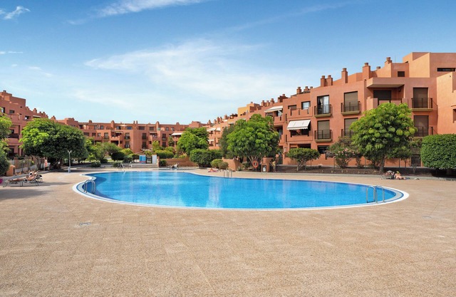 Vacation Home "Ático Beach Sotavento" with Shared Pool & Wi-Fi