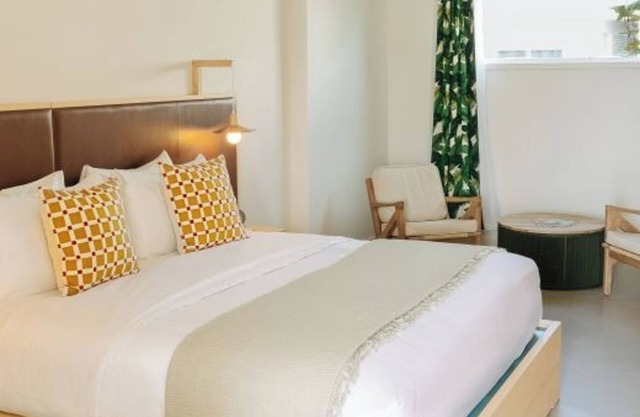 Vibrant Beachside Room Perfect for Relaxing Couples' Getaway