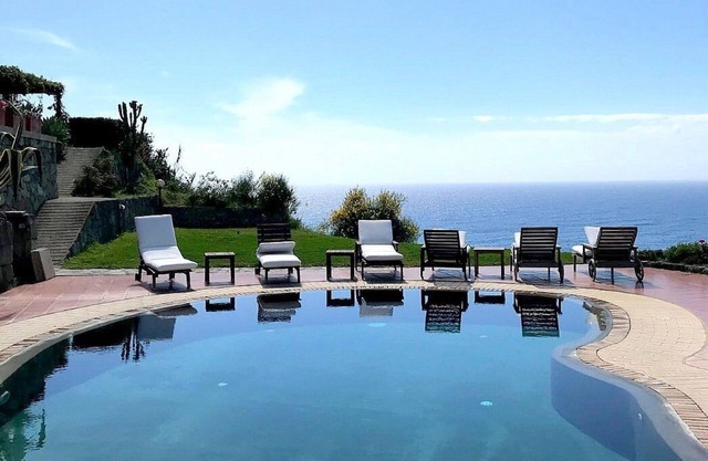 Villa Alisea: A splendid two-story villa located on a hillside, facing the sea, with Free WI-FI.