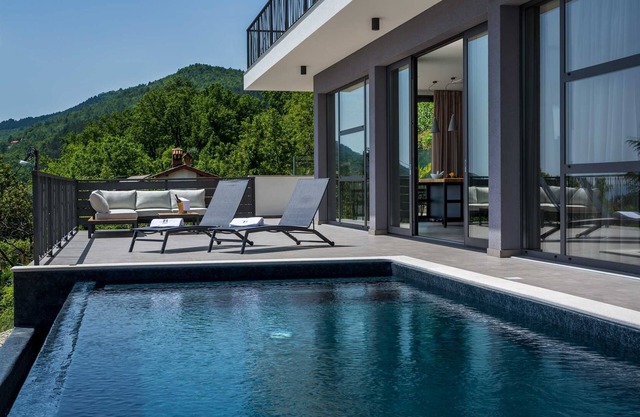 Villa Grand Vision - modern luxury villa with a private pool, sea views and 5 bedrooms