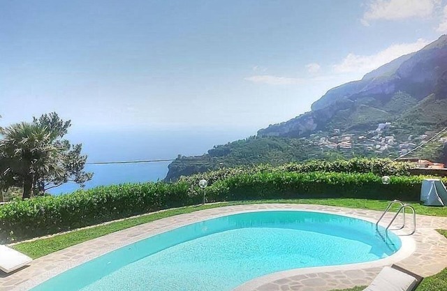 Villa Mabella: A bright and elegant three-story historical villa located on a hillside, facing the sea, with Free WI-FI.