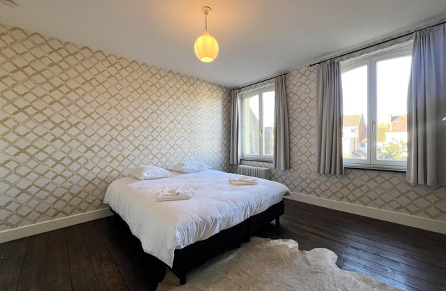 Villa with a stove and a hot tub in the Ardennes