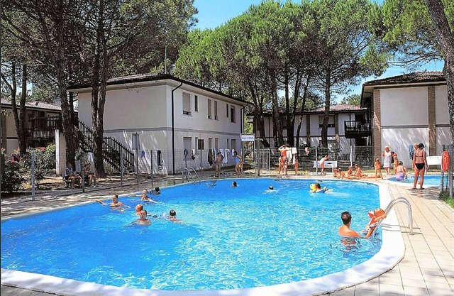 Villetta a schiera con piscina nella pineta