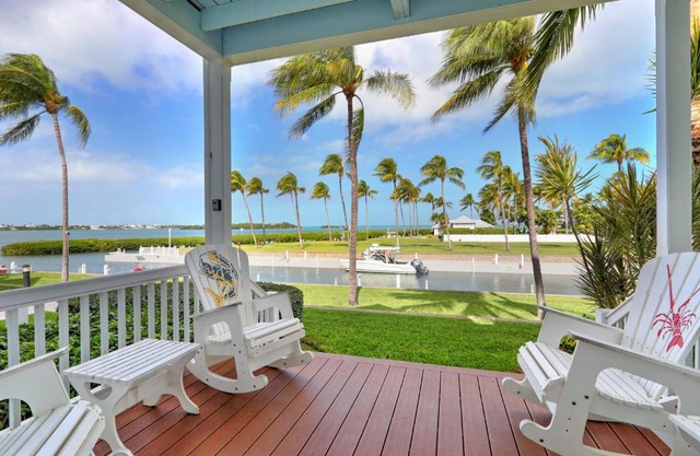 Waterfront luxury Villa 13 with sunset views and boat slip townhouse