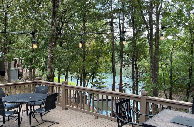 Waterfront. Private, covered, boat dock. Large living spaces inside and out.