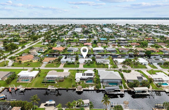 Waterfront Serenity beckons you to experience the ultimate canal-side retreat in stunning Cape Coral