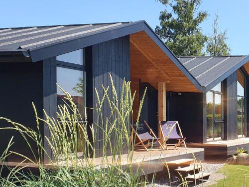 Werder Chalet - COZYKOJE - Ostsee Strand 150m I Sauna I eKamin I Tiny House mit Meerblick I 2 Pers und Kind I by "Meyers am Meer"