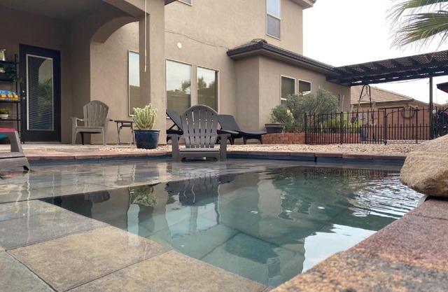 Zion RV Stone Pool Inn, Pets stay Free, fenced in yard, relaxing waterfall!