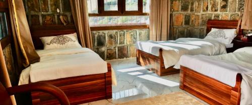 Wadi Bani Kharus Hotel | بيوت الضيافه