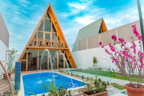 Al Kura Ski Chalet | شاليهات اكواخ كايا الفندقية