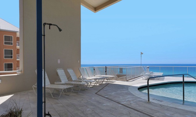West Panama City Beach Condo | 2BR Gulf Front Condo w/Pool, Gym, Hot Tub + Free Attraction Tickets!