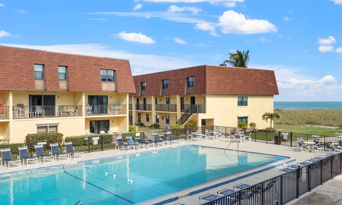 Avon By The Sea Condo | 2BR Sleeps 6 Pool BBQ Steps to Beach Pier Downtown