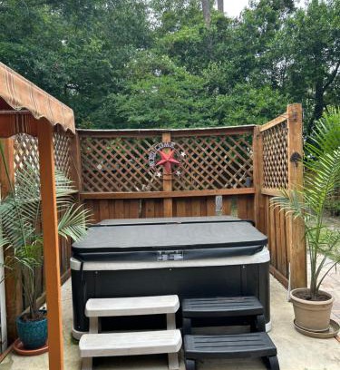 Wilmington House | 3 Bedroom Cozy Cottage with fenced in backyard and hot tub 4 miles to the beach